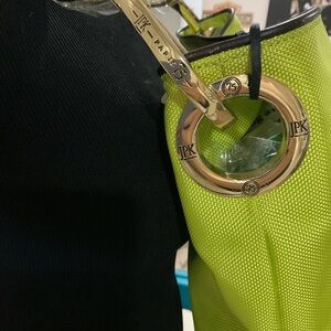 Green Textured Handbag with Metallic Ring Detail